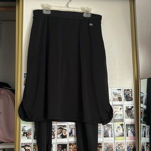 Black snoga worn zipper in the back